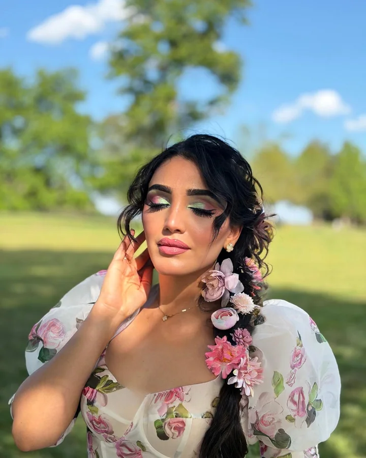 Outdoor floral makeup portrait by Hellah Naimi